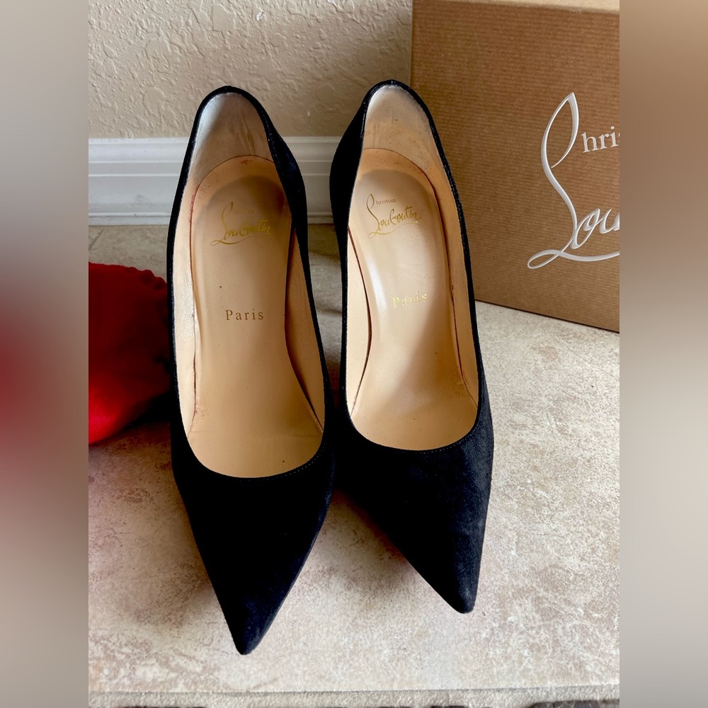 Christian Louboutin black pumps